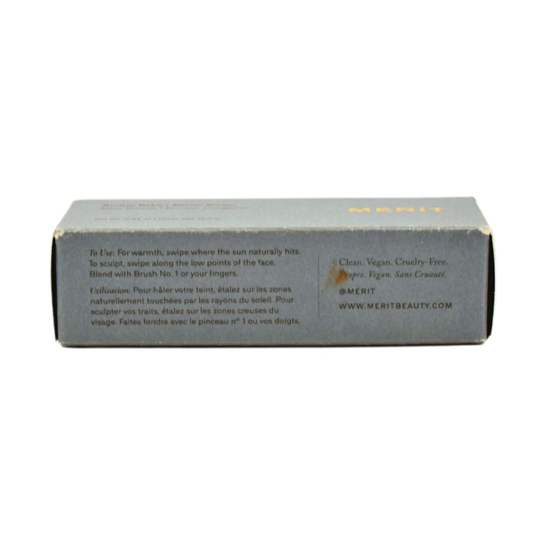 MERIT bronze balm swatched on skin arm demonstrating sheer buildable color