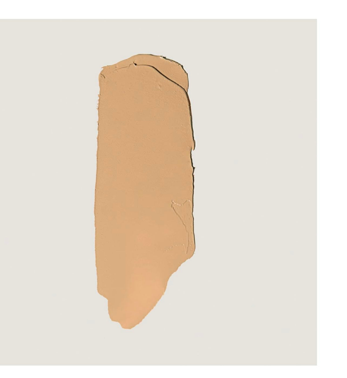 MERIT close-up of creamy stick texture illustrating smooth blendability