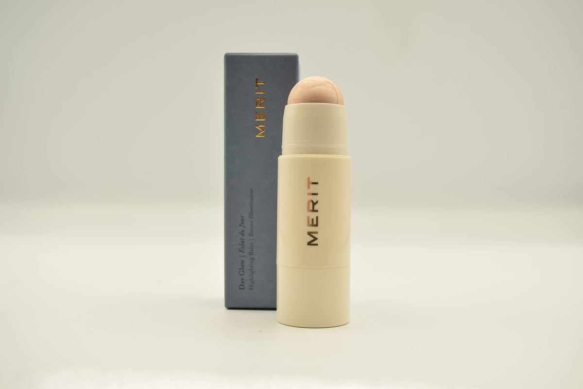 Merit Day Glow Cava texture close-up on fingertip showing creamy blendability and hydration