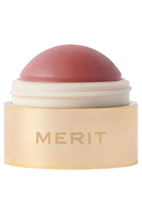 MERIT Flush Balm front packaging showing slim mauve stick and label, easy travel use