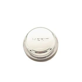 Merit Solo Shadow swatch on skin showcasing pearlescent bronze payoff benefit: true-to-tone color