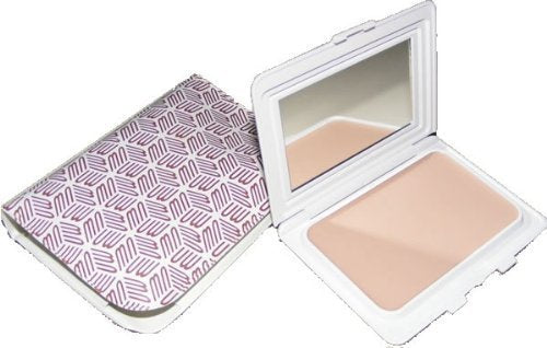 Merle Norman compact front view showing Alabaster Beige and sleek travel-friendly design