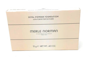 Merle Norman powder in use for on-the-go touch-ups delivering natural matte look