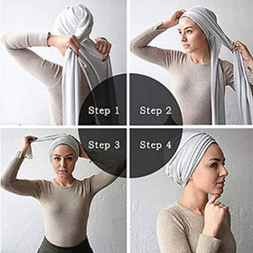 Messen scarf beside measuring tape showing 180cm length for versatile styling