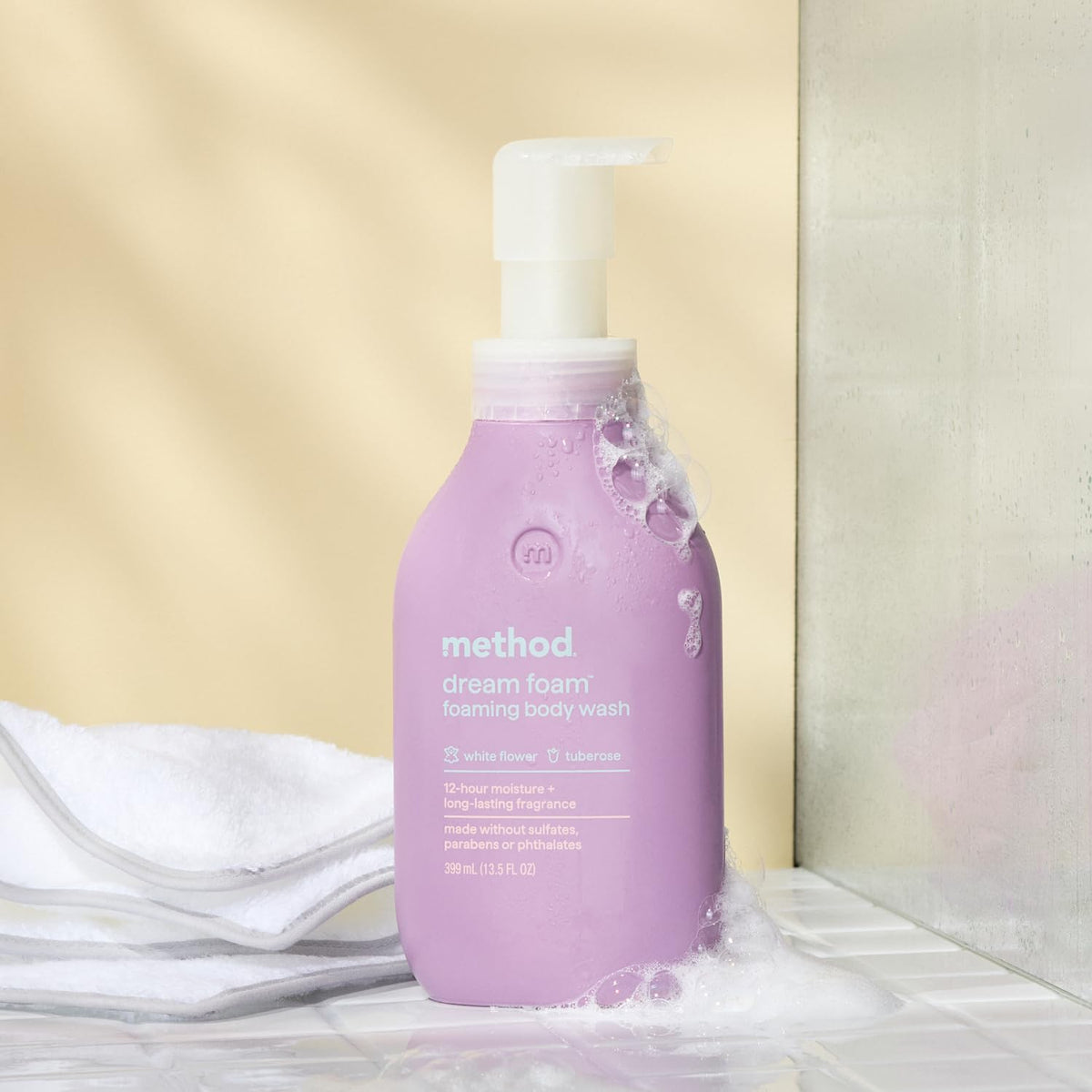 Method in-shower use with foam on shoulder, conveys effortless lathering benefit