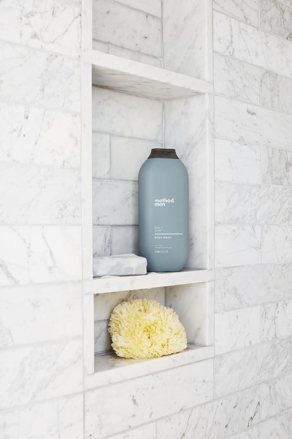 Method next to everyday items for scale showing generous 18 fl oz size