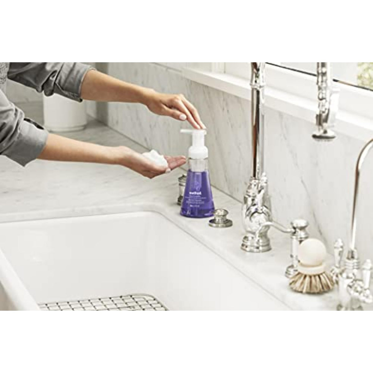 Method bottle next to measuring cup showing 10 fl oz size for storage planning
