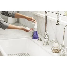 Method bottle next to measuring cup showing 10 fl oz size for storage planning