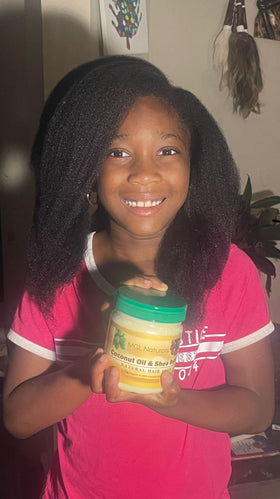 MGL Naturals scoop of shea and coconut demonstrating organic ingredients