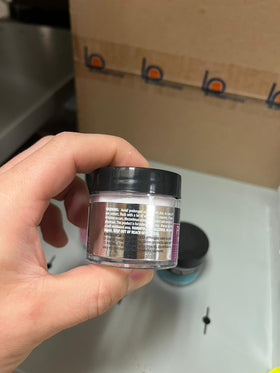 Mia Secret kit held in hand to show compact size and portability