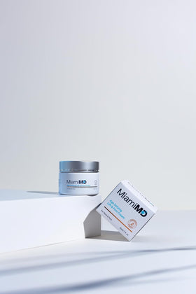 MiamiMD cream being applied to hand demonstrating quick absorption benefit