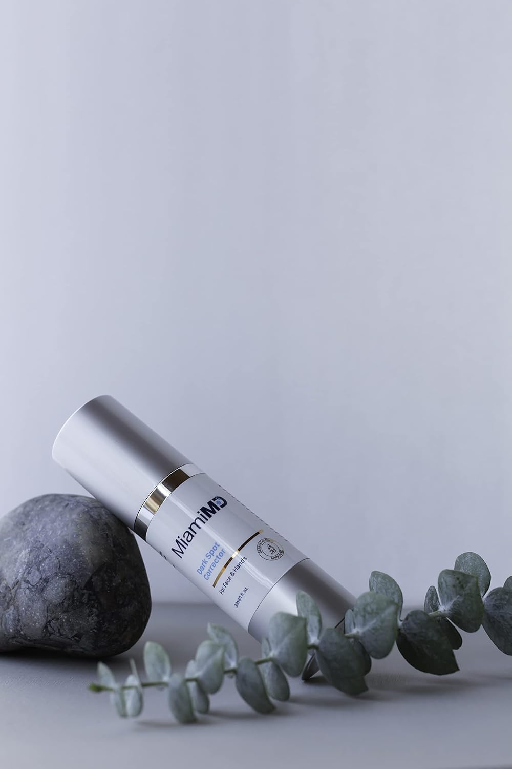 MiamiMD applying serum to face illustrating targeted use and even coverage