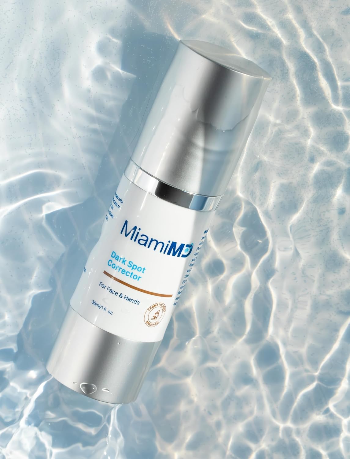 MiamiMD bottle held in hand to show 30ml size and portable convenience