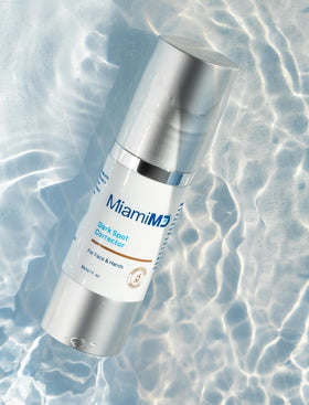MiamiMD bottle held in hand to show 30ml size and portable convenience