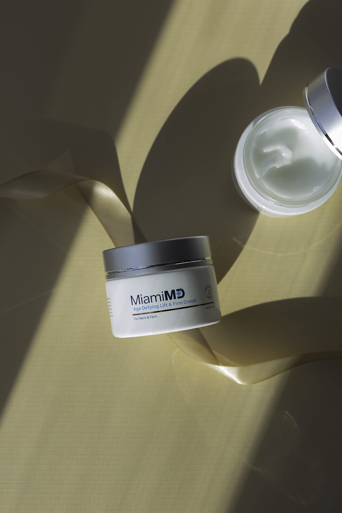MiamiMD jar on bathroom shelf staged for daily routine and aesthetic benefit