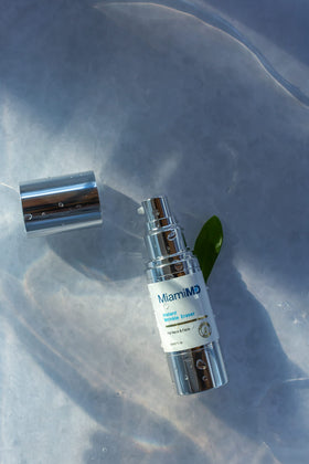 MiamiMD pipette dispensing 15ml serum highlighting precise, minimal-use dosing
