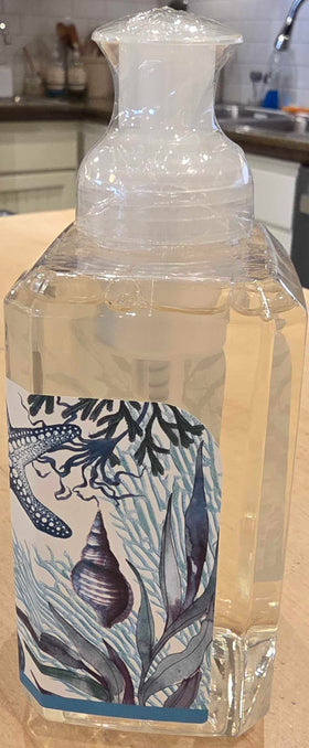 Michel Design Works bottle styled on bathroom counter adding coastal fragrance and visual charm