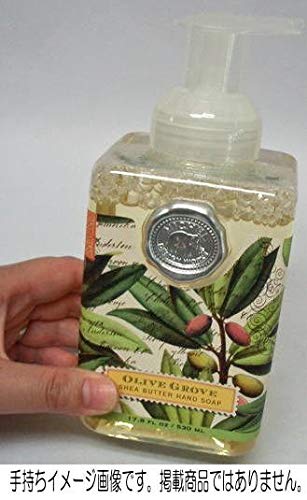 Michel Design Works bottle staged on a vanity with towel, adds coastal decor and convenience