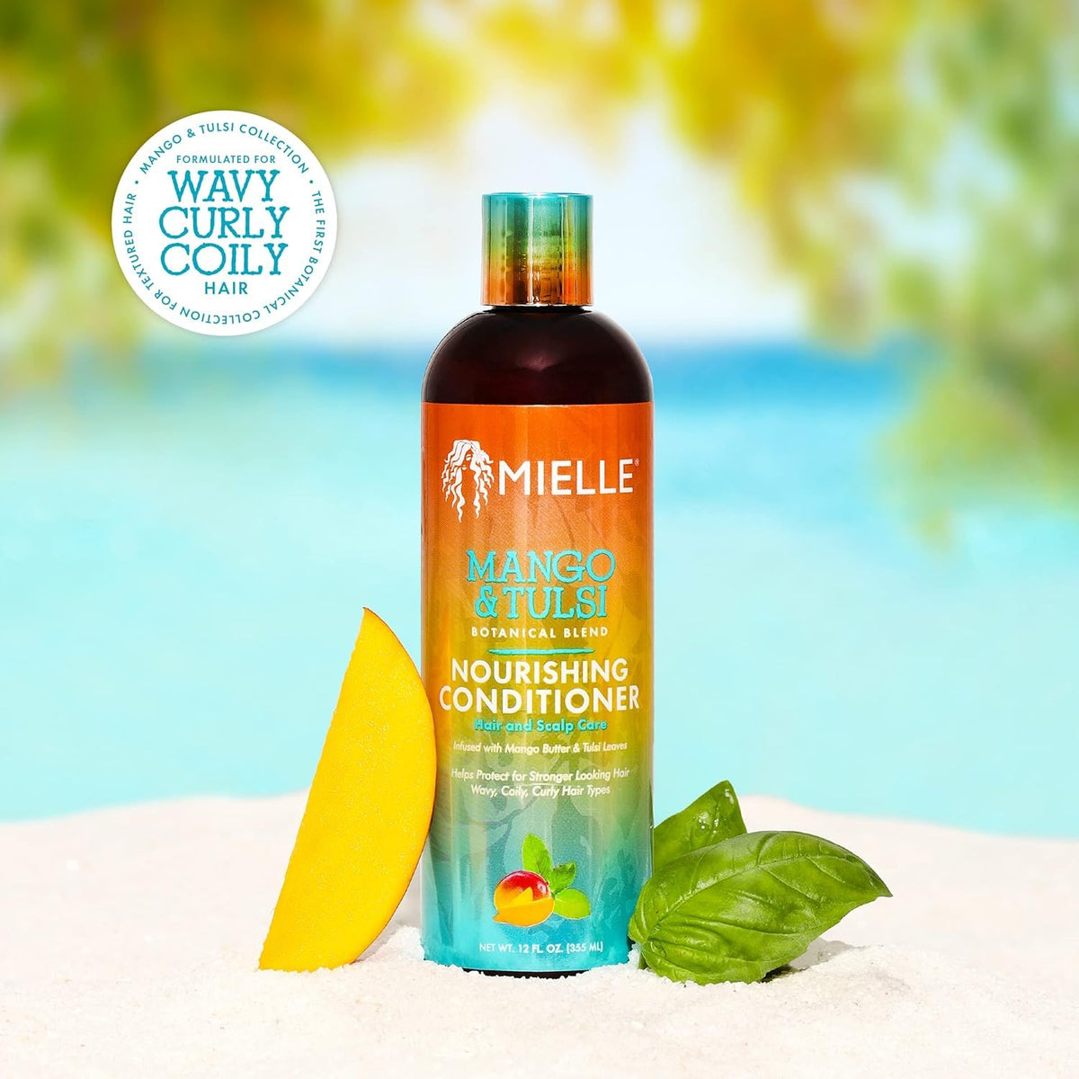 Mielle Organics conditioner applied to wet hair offering easy detangling