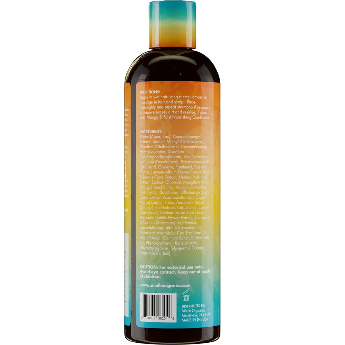Mielle Organics bottle in bathroom setting conveying routine-ready convenience