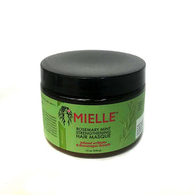 Mielle Organics masque texture scoop showing creamy hydration and deep-conditioning benefit