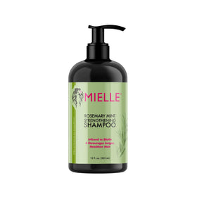 Mielle Organics shampoo pump close-up showing easy dispensing