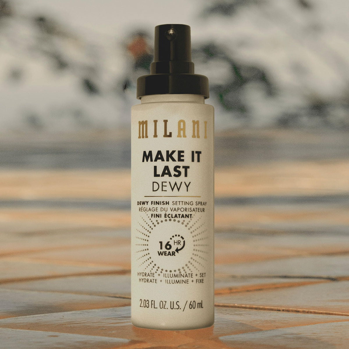 Milani bottle tucked in makeup bag showing portability and on-the-go refresh