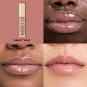 Milani gloss swatches on arm showing Rosewood and Soft Rose for color comparison benefit