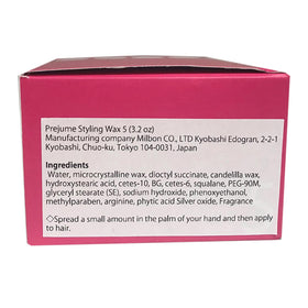 Milbon Prejume Wax 5 being warmed on hands for easy application and control