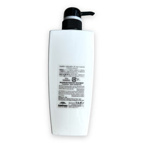 Milbon conditioner on bathroom shelf staged with towel showing easy at-home repair routine benefit