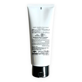 Milbon treatment in use by stylist improving damaged hair manageability