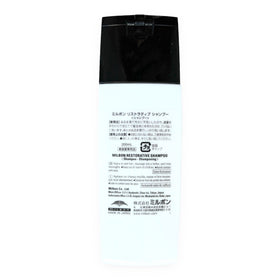 Milbon restorative shampoo in bathroom lifestyle scene highlighting salon-quality repair at home