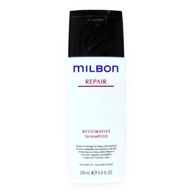 Milbon restorative shampoo creamy lather texture demonstrating gentle foam for effective cleaning