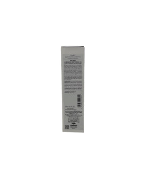 Milbon oil dispensed in hand demonstrating texture and easy absorption benefit