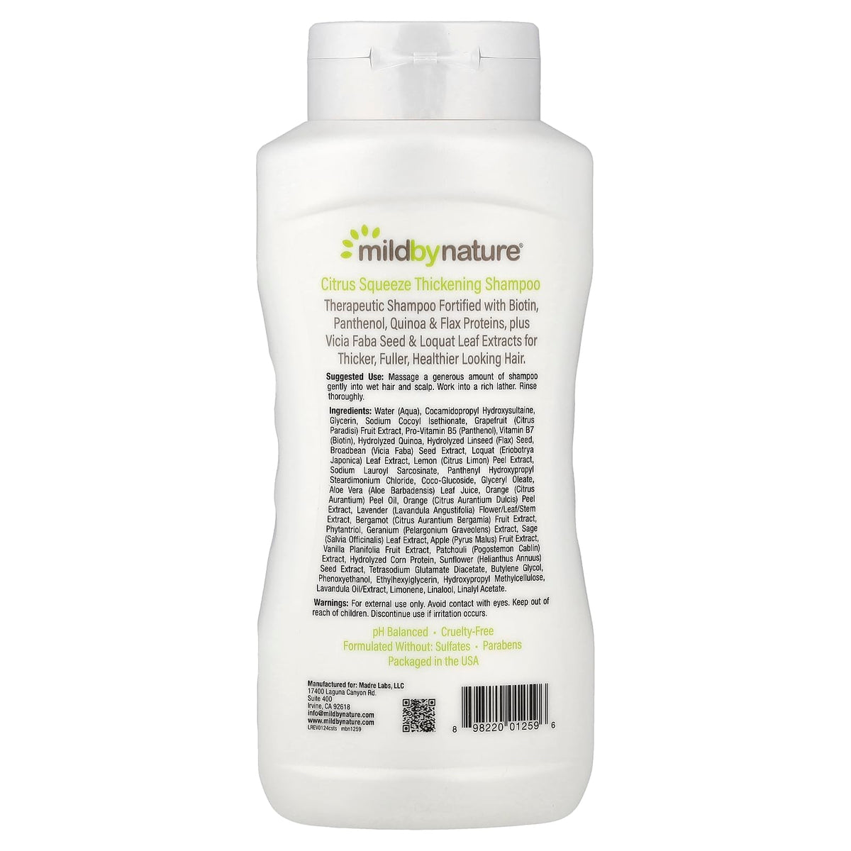 MILD BY NATURE pump and label close-up highlighting ingredients and clarity