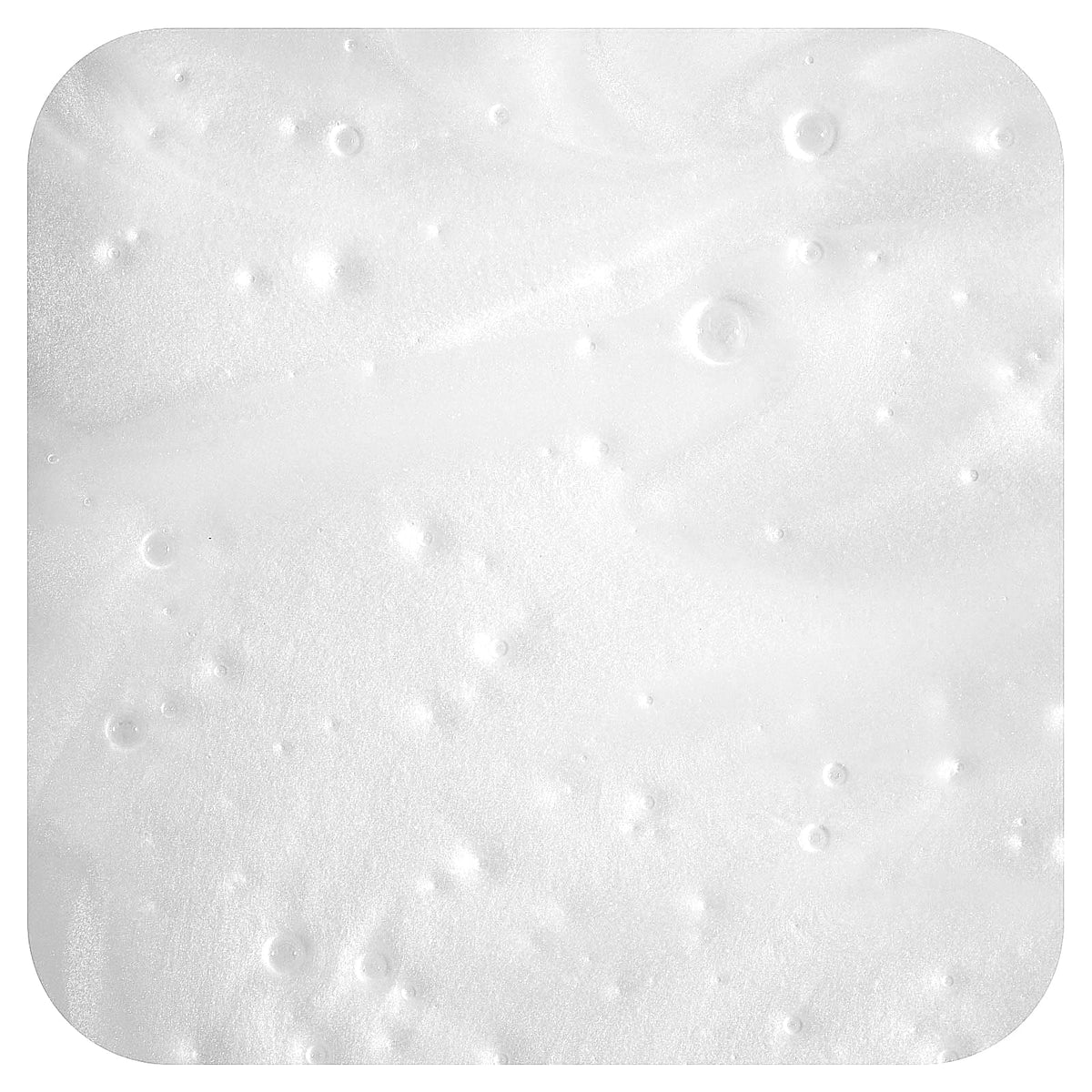 MILD BY NATURE shampoo lather texture illustrating gentle, voluminous foam