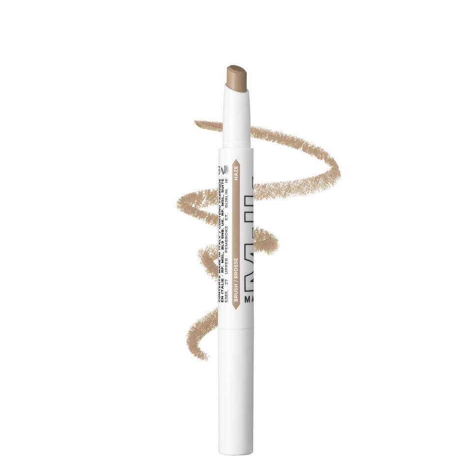 Milk Makeup front view of KUSH Brow Shadow Stick showing packaging and shade Haze benefits