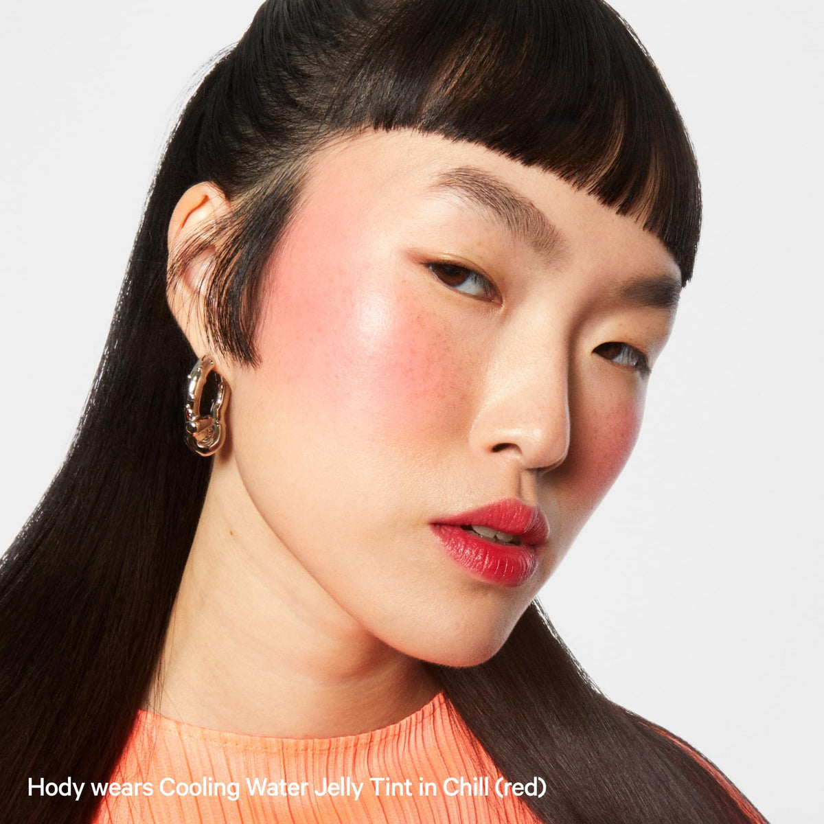 Milk Makeup Balmade texture close-up showing glossy balm and moisturizing look