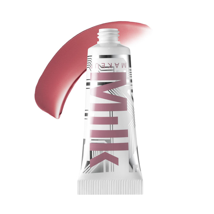 Milk Makeup front tube showing Infinity shade and compact travel size benefit