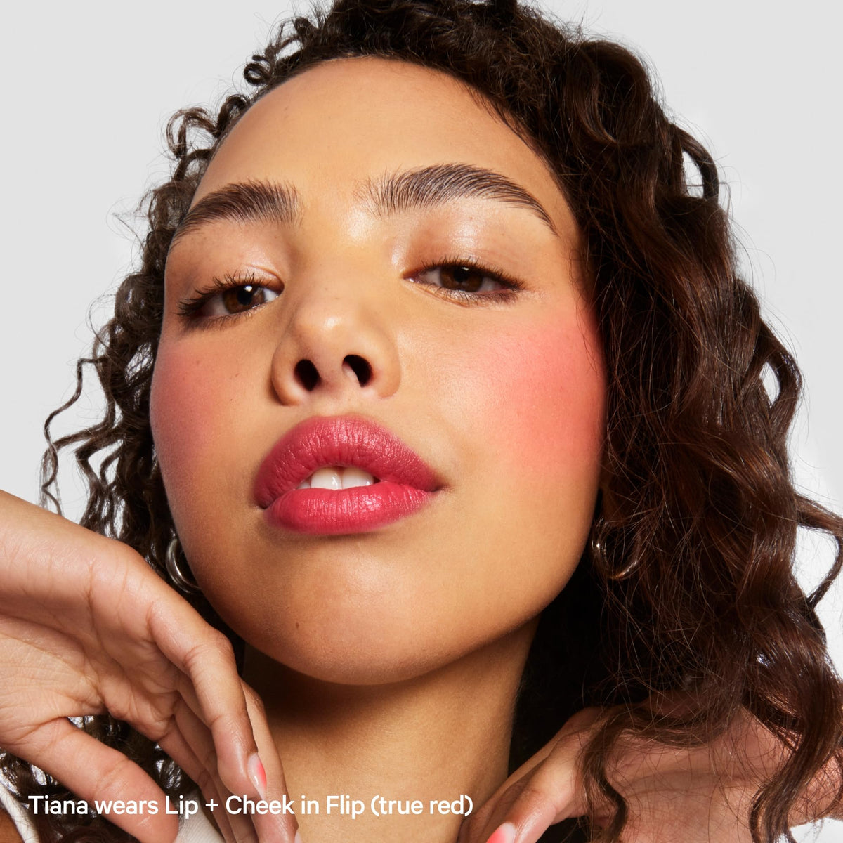Milk Makeup Flip in a handbag lifestyle shot for on-the-go touch-ups