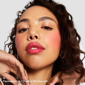 Milk Makeup Flip in a handbag lifestyle shot for on-the-go touch-ups