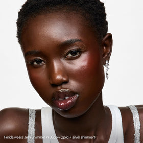 Milk Makeup used on lip and eyelid showing multi-use shimmer that enhances makeup looks