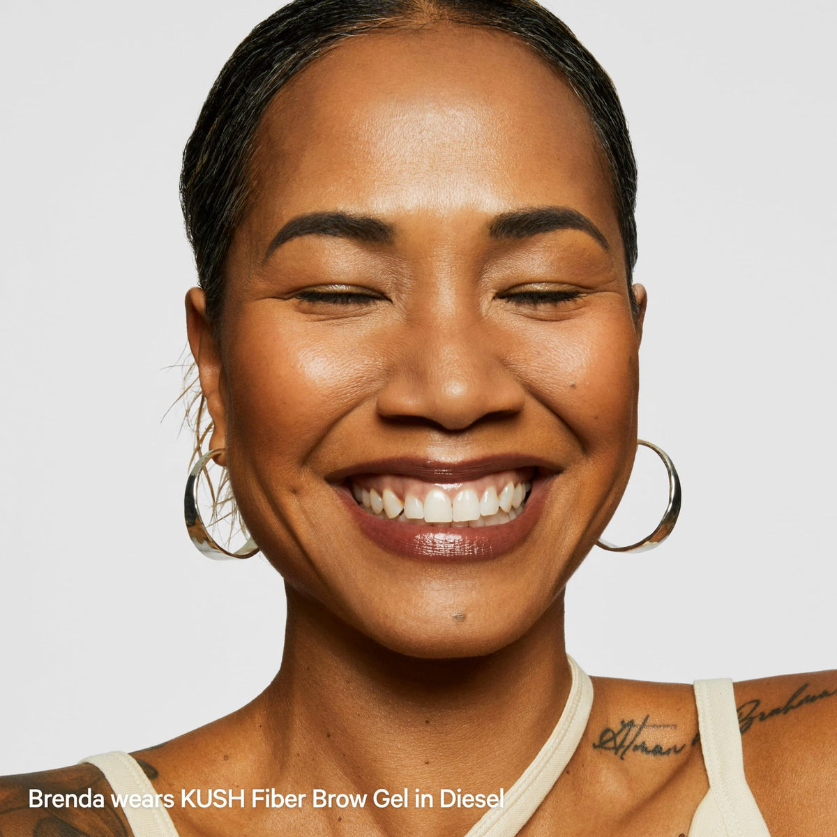 Milk Makeup finished styled brows showing conditioned, fluffed non-crunchy hold