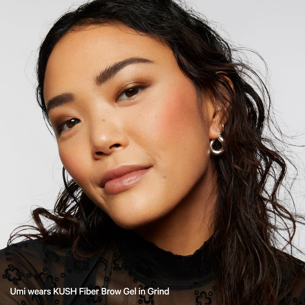 Milk Makeup in a makeup bag lifestyle shot showing portability and on-the-go styling benefit