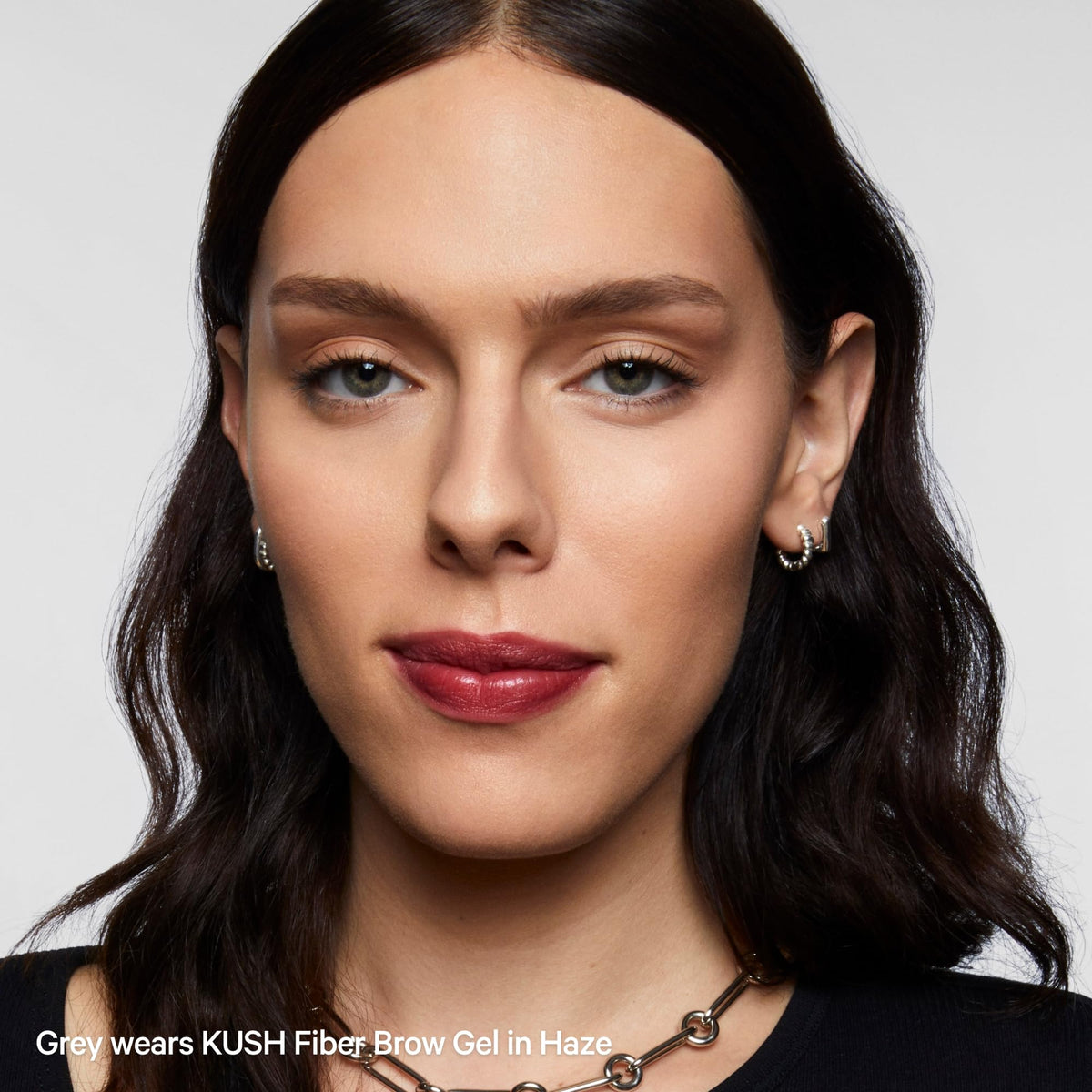 Milk Makeup KUSH lifestyle shot of model wearing Haze showing soft, fluffy brows