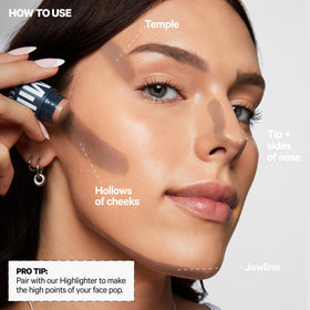 Milk Makeup Sculpt Stick next to a lipstick to show compact size and travel-friendly scale