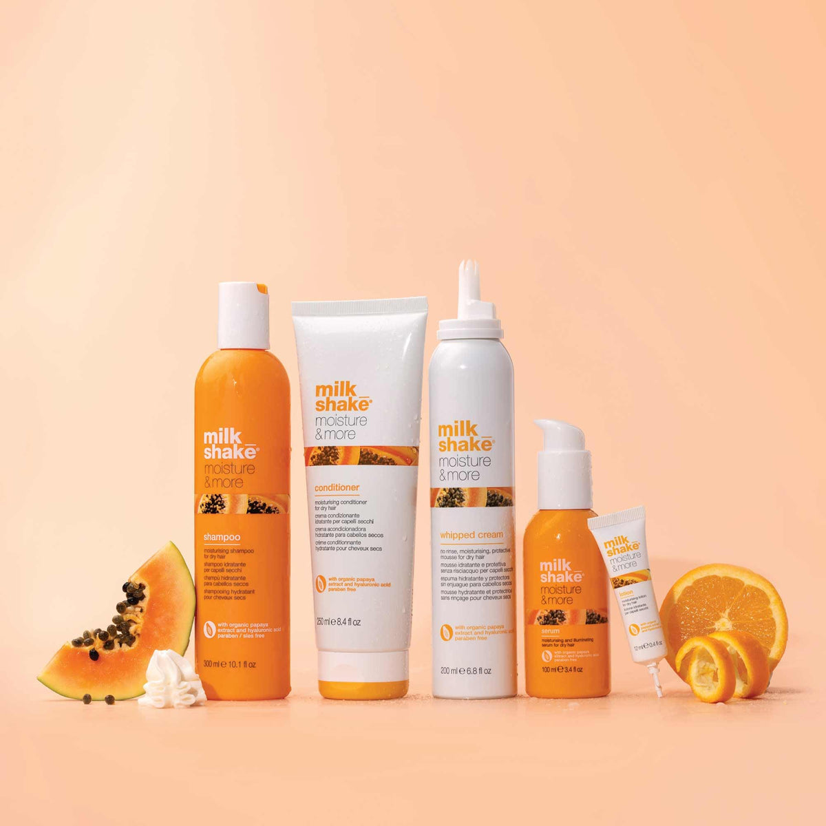 milk_shake held after styling to show polished, touchable hair and styling ease