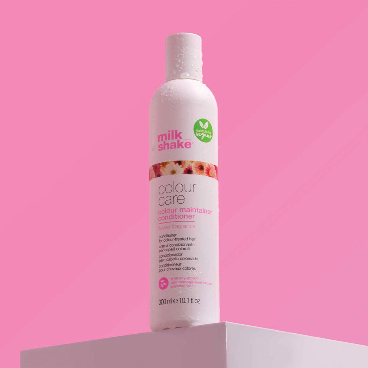 milk_shake conditioner being applied to color-treated hair for detangling
