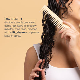 milk_shake Curl Passion being applied to wet curls illustrating detangling and softness benefit