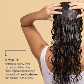 milk_shake bottle in shower showing shampoo in use